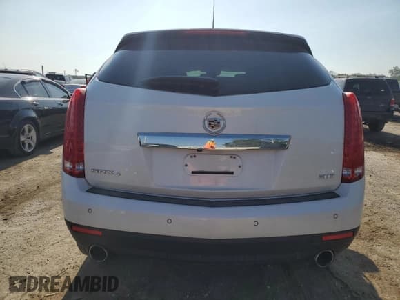 ✅ 2016 Cadillac SRX Premium Collection • VIN: 3GYFNDE32GS548343 • Lot: 63218175. Wystawiony na Copart z przebiegiem 91 265 mil. Bezpłatny archiwum sprzedaży aukcyjnych z USA i szczegółowy raport historii pojazdu na DreamBid. Zdjęcie 6.