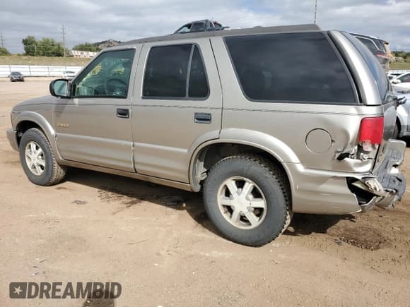 ✅ 1999 Oldsmobile Bravada • VIN: 1GHDT13W7X2720659 • Lot: 85552105. Wystawiony na Copart z przebiegiem 206 014 mil. Bezpłatny archiwum sprzedaży aukcyjnych z USA i szczegółowy raport historii pojazdu na DreamBid. Zdjęcie 2.