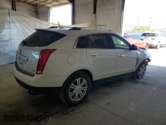 ✅ 2012 Cadillac SRX Luxury Collection • VIN: 3GYFNDE3XCS534703 • Лот: 86767995. Опубликован ранее на Copart с пробегом 92 320 миль. Бесплатный доступ к архиву аукционных продаж из США и подробный отчёт об истории автомобиля на DreamBid. Изображение 3.
