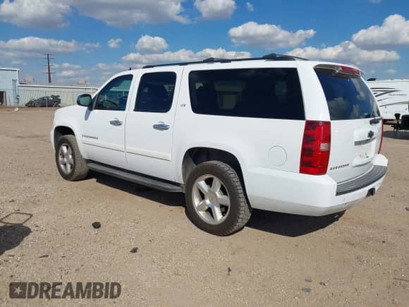 2008 Chevrolet Suburban LTZ z VIN 1GNFK16318R127690, wystawiony jako IAAI lot #43424584 z przebiegiem 278 244 mil mil oraz . Historia ofert i sprzedaży dostępna na DreamBid. Obrazek 3.