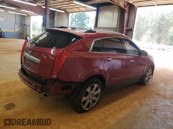✅ 2011 Cadillac SRX Premium Collection • VIN: 3GYFNCEY2BS578425 • Lot: 70640675. Wystawiony na Copart z przebiegiem Nie podano. Bezpłatny archiwum sprzedaży aukcyjnych z USA i szczegółowy raport historii pojazdu na DreamBid. Zdjęcie 3.