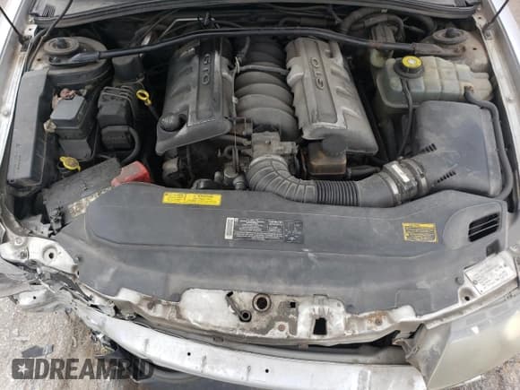 ✅ 2004 Pontiac GTO • VIN: 6G2VX12G84L280263 • Lot: 66575924. Wystawiony na Copart z przebiegiem 112 302 mil. Bezpłatny archiwum sprzedaży aukcyjnych z USA i szczegółowy raport historii pojazdu na DreamBid. Zdjęcie 11.