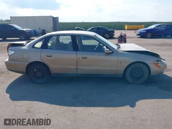 2001 Saturn LS с VIN 1G8JU52F81Y581770, выставлен на аукционе IAAI как лот 43006239 с пробегом 151 286 миль миль и . История ставок и продаж доступна на DreamBid. Изображение 13.