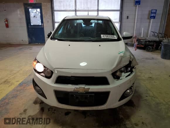 2012 Chevrolet Sonic LTZ with VIN 1G1JE5SH9C4143735, listed as a Copart auction lot 47083355 with 109,585 mi miles and Salvage title. Bid and sale history available at DreamBid. Image 5.