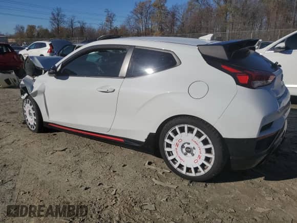 2020 Hyundai Veloster z VIN KMHT36AH1LU005521, wystawiony jako Copart lot #81643194 z przebiegiem Nie podano mil oraz Szkoda całkowita • Salvage title. Historia ofert i sprzedaży dostępna na DreamBid. Obrazek 2.