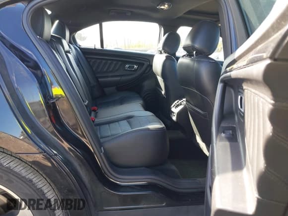 ✅ 2014 Ford Taurus SHO • VIN: 1FAHP2KT2EG135969 • Lot: 43614628. Listed on IAAI with 130,233 mi. Free auction sales archive from the USA and detailed vehicle history report at DreamBid. Image 8.