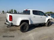 ✅ 2018 Chevrolet Colorado 4WD Z71 • VIN: 1GCGTDENXJ1306345 • Лот: 43760073. Опубликован ранее на Copart с пробегом 60 051 миль. Бесплатный доступ к архиву аукционных продаж из США и подробный отчёт об истории автомобиля на DreamBid. Изображение 3.