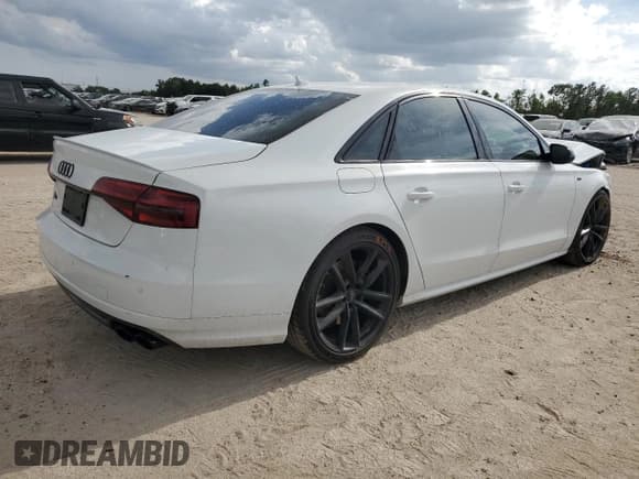 ✅ 2016 Audi S8 Plus • VIN: WUAJ5AFD9GN900790 • Lot: 64053684. Listed on Copart with 62,669 mi. Free auction sales archive from the USA and detailed vehicle history report at DreamBid. Image 3.