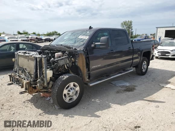 ✅ 2016 Chevrolet Silverado 2500HD LT • VIN: 1GC1KVEG8GF204585 • Lot: 69749705. Wystawiony na Copart z przebiegiem 194 911 mil. Bezpłatny archiwum sprzedaży aukcyjnych z USA i szczegółowy raport historii pojazdu na DreamBid. Zdjęcie 1.