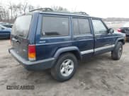 ✅ 2001 Jeep Cherokee Sport • VIN: 1J4FF48SX1L620872 • Lot: 43894063. Listed on IAAI with 164,586 mi. Free auction sales archive from the USA and detailed vehicle history report at DreamBid. Image 4.