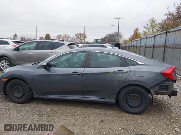 ✅ 2020 Honda Civic LX • VIN: 2HGFC2F60LH587701 • Lot: 43741941. Listed on IAAI with 111,256 mi. Free auction sales archive from the USA and detailed vehicle history report at DreamBid. Image 14.