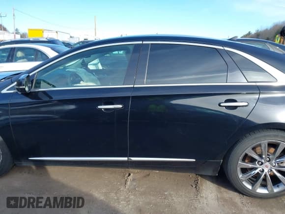 ✅ 2014 Cadillac XTS Livery • VIN: 2G61U5S35E9263713 • Лот: 41570661. Опубликован ранее на IAAI с пробегом 354 074 миль. Бесплатный доступ к архиву аукционных продаж из США и подробный отчёт об истории автомобиля на DreamBid. Изображение 14.