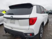 ✅ 2022 Honda Passport EX-L • VIN: 5FNYF7H52NB000391 • Lot: 43701906. Listed on IAAI with 45,200 mi. Free auction sales archive from the USA and detailed vehicle history report at DreamBid. Image 4.