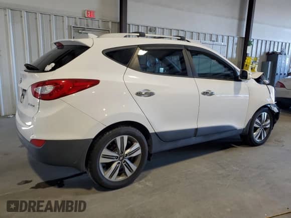 2015 Hyundai Tucson SE z VIN KM8JU3AG2FU101785, wystawiony jako Copart lot #79221663 z przebiegiem 101 846 mil mil oraz . Historia ofert i sprzedaży dostępna na DreamBid. Obrazek 3.