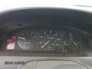 ✅ 1993 Mazda MX-6 • VIN: 1YVGE31A2P5228999 • Lot: 80751524. Wystawiony na Copart z przebiegiem 138 398 mil. Bezpłatny archiwum sprzedaży aukcyjnych z USA i szczegółowy raport historii pojazdu na DreamBid. Zdjęcie 9.