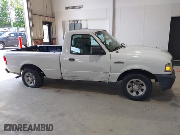 ✅ 2009 Ford Ranger XL • VIN: 1FTYR10D39PA41440 • Lot: 42792365. Listed on IAAI with 197,248 mi. Free auction sales archive from the USA and detailed vehicle history report at DreamBid. Image 13.