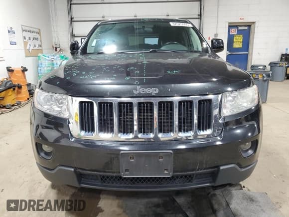 ✅ 2012 Jeep Grand Cherokee Laredo • VIN: 1C4RJFAG8CC128847 • Lot: 82525595. Wystawiony na Copart z przebiegiem 173 549 mil. Bezpłatny archiwum sprzedaży aukcyjnych z USA i szczegółowy raport historii pojazdu na DreamBid. Zdjęcie 5.