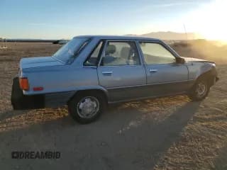 ✅ 1986 Toyota Camry • VIN: JT2SV12E9G0477991 • Lot: 85531214. Wystawiony na Copart z przebiegiem 297 033 mil. Bezpłatny archiwum sprzedaży aukcyjnych z USA i szczegółowy raport historii pojazdu na DreamBid. Zdjęcie 3.