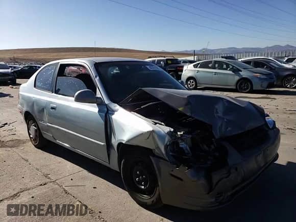 2005 Hyundai Accent GLS z VIN KMHCG35C55U337255, wystawiony jako Copart lot #43761985 z przebiegiem 192 585 mil mil oraz Szkoda całkowita • Salvage title. Historia ofert i sprzedaży dostępna na DreamBid. Obrazek 11.