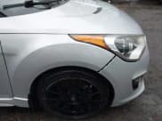 ✅ 2013 Hyundai Veloster Turbo • VIN: KMHTC6AE8DU180551 • Lot: 43890541. Listed on IAAI with 118,989 mi. Free auction sales archive from the USA and detailed vehicle history report at DreamBid. Image 12.