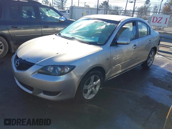 ✅ 2005 Mazda 3 i • VIN: JM1BK12F951314175 • Лот: 41097728. Опубликован ранее на IAAI с пробегом 243 085 миль. Бесплатный доступ к архиву аукционных продаж из США и подробный отчёт об истории автомобиля на DreamBid. Изображение 2.