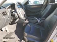 ✅ 2013 BMW X1 28i • VIN: WBAVM1C54DVL64127 • Лот: 92442935. Опубликован ранее на Copart с пробегом Не указан. Бесплатный доступ к архиву аукционных продаж из США и подробный отчёт об истории автомобиля на DreamBid. Изображение 7.