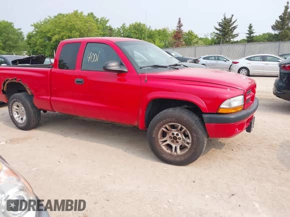 2003 Dodge Dakota Sport z VIN 1D7HG32NX3S296233, wystawiony jako IAAI lot #42394001 z przebiegiem 224 887 mil mil oraz . Historia ofert i sprzedaży dostępna na DreamBid. Obrazek 1.