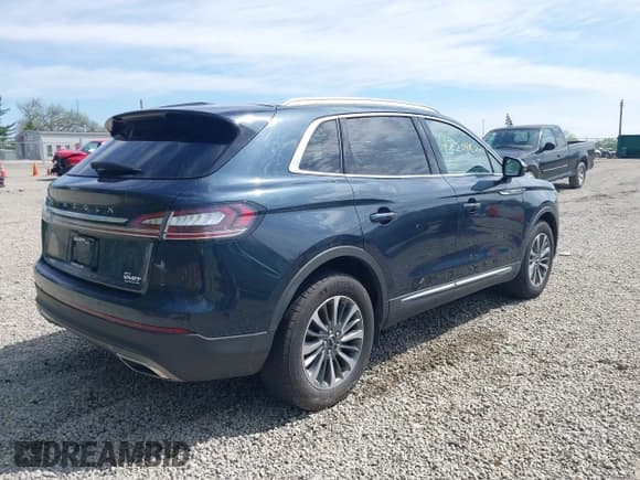 ✅ 2021 Lincoln Nautilus Standard • VIN: 2LMPJ8J92MBL10856 • Lot: 42204825. Listed on IAAI with 26,694 mi. Free auction sales archive from the USA and detailed vehicle history report at DreamBid. Image 4.