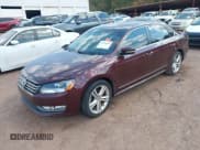 ✅ 2014 Volkswagen Passat SEL Premium • VIN: 1VWCS7A36EC032673 • Lot: 43230283. Listed on IAAI with 136,340 mi. Free auction sales archive from the USA and detailed vehicle history report at DreamBid. Image 2.
