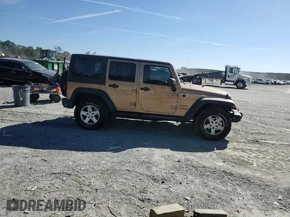 ✅ 2015 Jeep Wrangler Unlimited Sport • VIN: 1C4HJWDG7FL620619 • Лот: 82568875. Опубликован ранее на Copart с пробегом 95 171 миль. Бесплатный доступ к архиву аукционных продаж из США и подробный отчёт об истории автомобиля на DreamBid. Изображение 14.