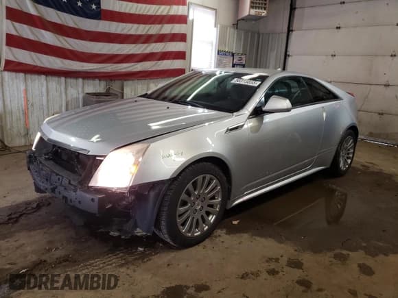 ✅ 2013 Cadillac CTS • VIN: 1G6DC1E34D0168248 • Lot: 50315855. Listed on Copart with 104,134 mi. Free auction sales archive from the USA and detailed vehicle history report at DreamBid. Image 1.