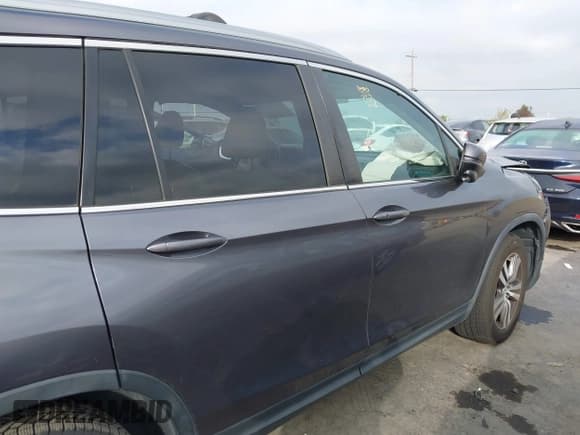 ✅ 2018 Honda Pilot EX-L • VIN: 5FNYF6H57JB014338 • Lot: 43791400. Listed on IAAI with 70,924 mi. Free auction sales archive from the USA and detailed vehicle history report at DreamBid. Image 14.