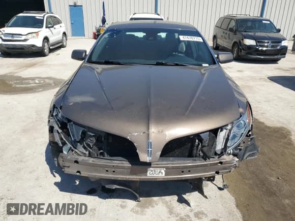 ✅ 2015 Lincoln MKS EcoBoost • VIN: 1LNHL9FT0FG602960 • Lot: 47478715. Wystawiony na Copart z przebiegiem 94 781 mil. Bezpłatny archiwum sprzedaży aukcyjnych z USA i szczegółowy raport historii pojazdu na DreamBid. Zdjęcie 5.