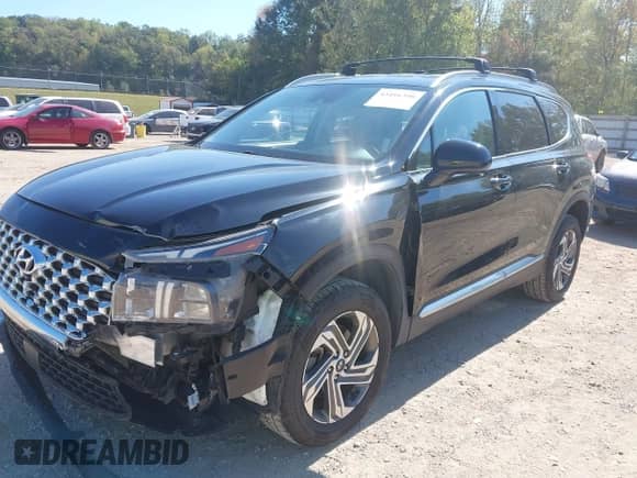 2021 Hyundai Santa Fe SEL with VIN 5NMS2DAJ9MH325043, listed as a IAAI auction lot 43416390 with 60,379 mi miles and . Bid and sale history available at DreamBid. Image 2.