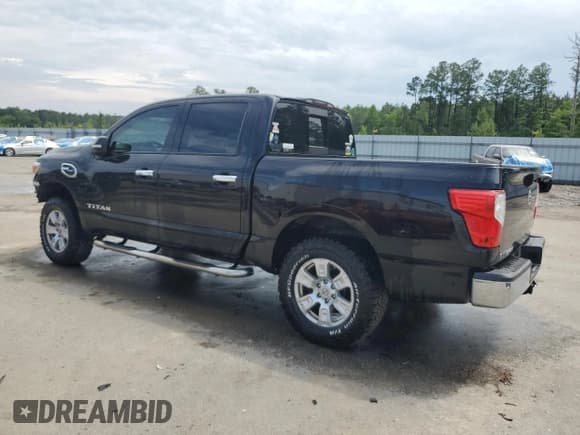 ✅ 2017 Nissan Titan SV • VIN: 1N6AA1EJ2HN542141 • Lot: 56014025. Listed on Copart with 100,696 mi. Free auction sales archive from the USA and detailed vehicle history report at DreamBid. Image 2.