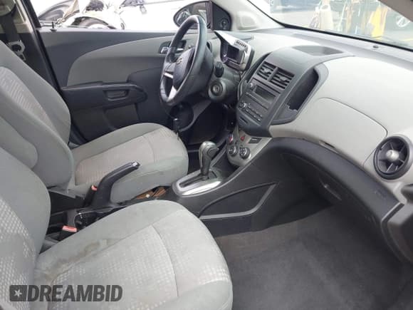 ✅ 2013 Chevrolet Sonic LS • VIN: 1G1JA6SG3D4239239 • Lot: 43304489. Listed on IAAI with 100,388 mi. Free auction sales archive from the USA and detailed vehicle history report at DreamBid. Image 5.
