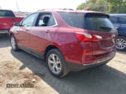 ✅ 2019 Chevrolet Equinox Premier • VIN: 2GNAXNEV4K6148056 • Lot: 43203166. Listed on IAAI with 66,972 mi. Free auction sales archive from the USA and detailed vehicle history report at DreamBid. Image 3.