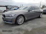 ✅ 2017 BMW 7 Series 740i • VIN: WBA7E2C52HG739390 • Lot: 81669495. Listed on Copart with 124,451 mi. Free auction sales archive from the USA and detailed vehicle history report at DreamBid. Image 1.