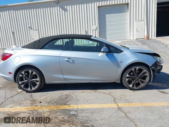 ✅ 2016 Buick Cascada Premium • VIN: W04WT3N55GG117334 • Lot: 43453849. Wystawiony na IAAI z przebiegiem 194 673 mil. Bezpłatny archiwum sprzedaży aukcyjnych z USA i szczegółowy raport historii pojazdu na DreamBid. Zdjęcie 13.