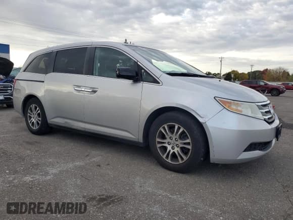 ✅ 2011 Honda Odyssey EX-L • VIN: 5FNRL5H62BB009954 • Lot: 87390455. Listed on Copart with 162,357 mi. Free auction sales archive from the USA and detailed vehicle history report at DreamBid. Image 4.