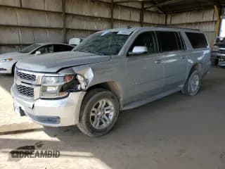 ✅ 2015 Chevrolet Suburban LT • VIN: 1GNSCJKC1FR162633 • Lot: 77006654. Wystawiony na Copart z przebiegiem 100 741 mil. Bezpłatny archiwum sprzedaży aukcyjnych z USA i szczegółowy raport historii pojazdu na DreamBid. Zdjęcie 1.