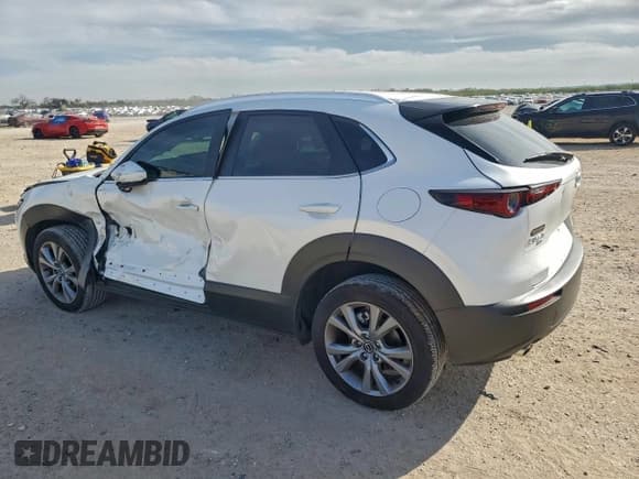 ✅ 2023 Mazda CX-30 S Select • VIN: 3MVDMBBM7PM560542 • Lot: 94560395. Wystawiony na Copart z przebiegiem 4 308 mil. Bezpłatny archiwum sprzedaży aukcyjnych z USA i szczegółowy raport historii pojazdu na DreamBid. Zdjęcie 2.