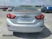 ✅ 2018 Chevrolet Cruze LT • VIN: 1G1BE5SM2J7114834 • Lot: 80557205. Listed on Copart with 131,256 mi. Free auction sales archive from the USA and detailed vehicle history report at DreamBid. Image 6.