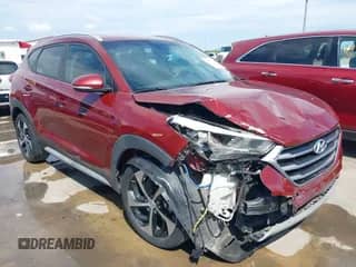 2018 Hyundai Tucson Sport z VIN KM8J33AL1JU800561, wystawiony jako IAAI lot #42471795 z przebiegiem 81 809 mil mil oraz . Historia ofert i sprzedaży dostępna na DreamBid. Obrazek 1.