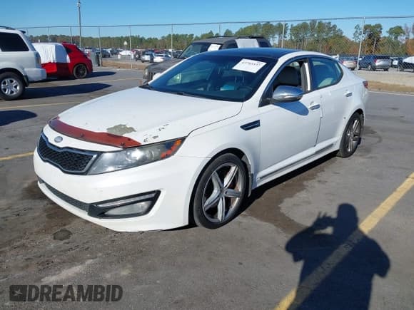 ✅ 2013 Kia Optima SX • VIN: 5XXGR4A66DG208323 • Лот: 43703537. Опубликован ранее на IAAI с пробегом 247 509 миль. Бесплатный доступ к архиву аукционных продаж из США и подробный отчёт об истории автомобиля на DreamBid. Изображение 2.