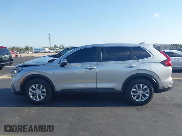 ✅ 2025 Honda CR-V LX • VIN: 7FARS3H28SE002967 • Lot: 42213245. Listed on IAAI with 4,968 mi. Free auction sales archive from the USA and detailed vehicle history report at DreamBid. Image 14.