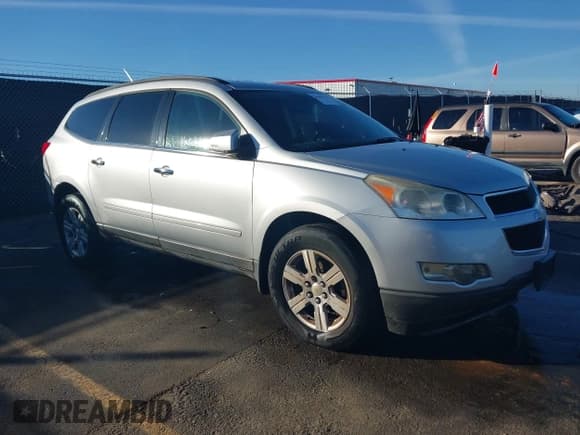 ✅ 2012 Chevrolet Traverse 2LT • VIN: 1GNKRJED8CJ277940 • Lot: 43601515. Listed on IAAI with 270,008 mi. Free auction sales archive from the USA and detailed vehicle history report at DreamBid. Image 1.