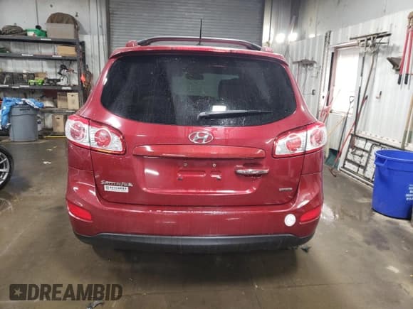 ✅ 2012 Hyundai Santa Fe Limited • VIN: 5XYZK4AG4CG112240 • Lot: 77424994. Listed on Copart with 217,853 mi. Free auction sales archive from the USA and detailed vehicle history report at DreamBid. Image 6.