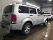 2008 Dodge Nitro SXT с VIN 1D8GU28KX8W129037, выставлен на аукционе Copart как лот 79534734 с пробегом 162 073 миль миль и Списание • Salvage title. История ставок и продаж доступна на DreamBid. Изображение 3.