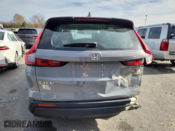 ✅ 2024 Honda CR-V LX • VIN: 2HKRS4H21RH420767 • Lot: 91910635. Wystawiony na Copart z przebiegiem 29 871 mil. Bezpłatny archiwum sprzedaży aukcyjnych z USA i szczegółowy raport historii pojazdu na DreamBid. Zdjęcie 6.